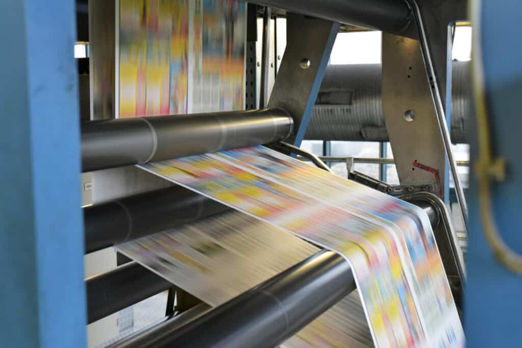 Printing Press running ads